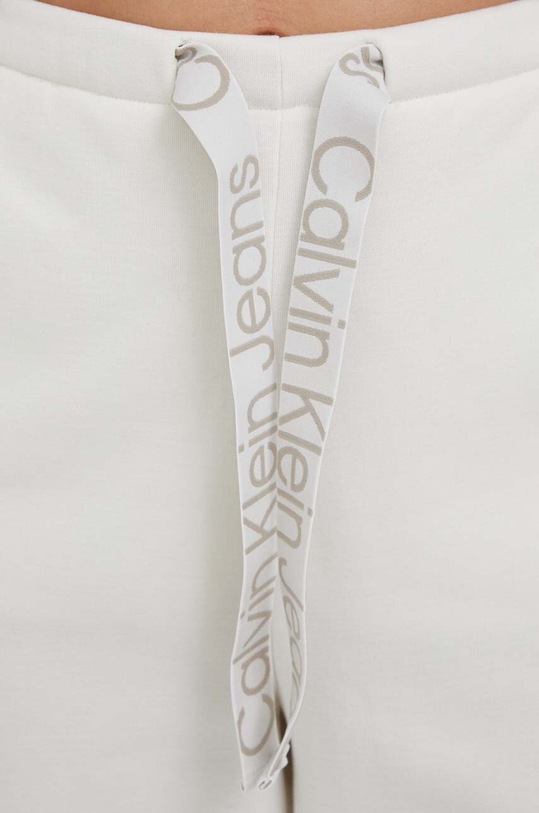 Спортен панталон Calvin Klein Jeans бежов J20J221916