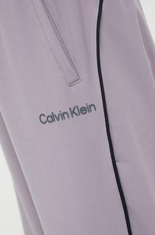 Tréningové nohavice Calvin Klein Performance fialová 00GWF3P630