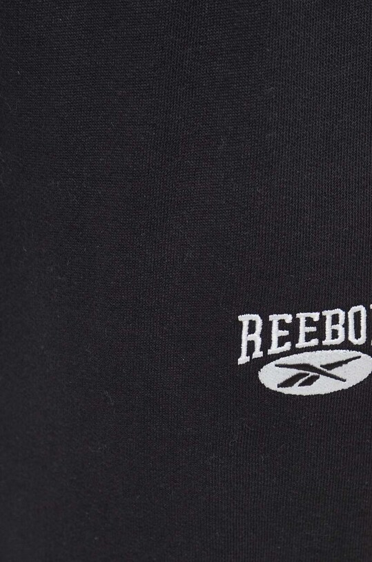 Одяг Бавовняні спортивні штани Reebok Classic 100036324 чорний