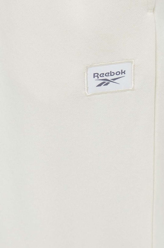 Reebok Classic spodnie dresowe beżowy 100030900