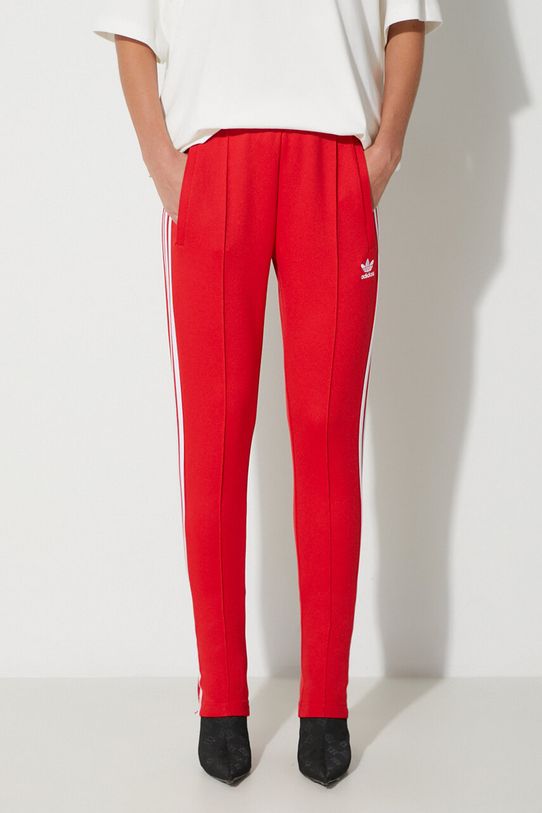 Tepláky adidas Originals SST Classic TP nášivka červená IK6603