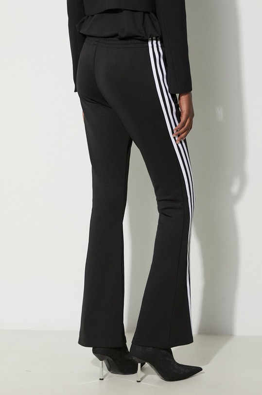 Odzież adidas Originals spodnie dresowe Flared TP IV9327 czarny