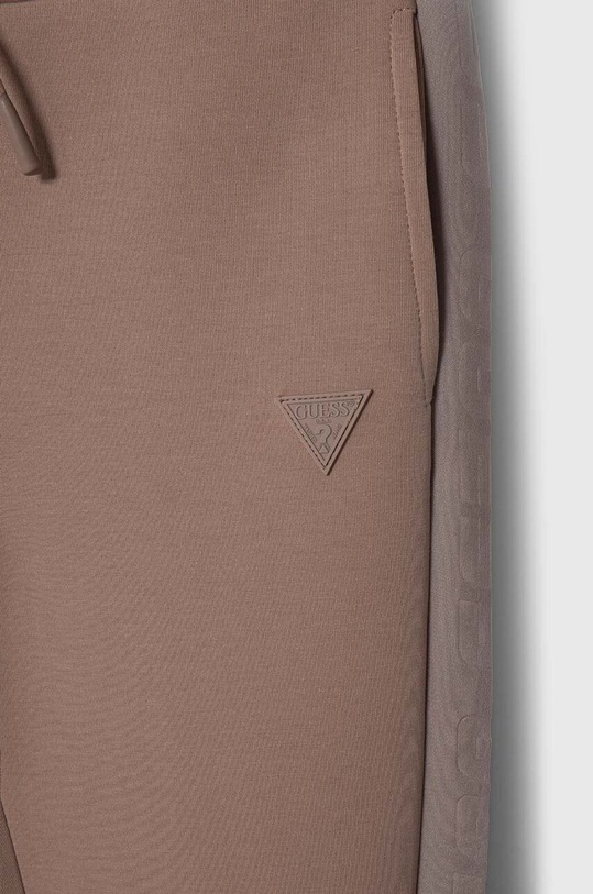 Dziewczynka Guess spodnie dresowe dziecięce J2YQ24.FL03S.9BYX różowy