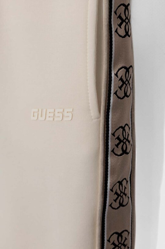 Дитячі спортивні штани Guess бежевий J2YQ27.KB3P2.9BYX