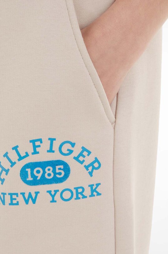 Детские спортивные штаны Tommy Hilfiger KG0KG07605.128.176.9BYX бежевый