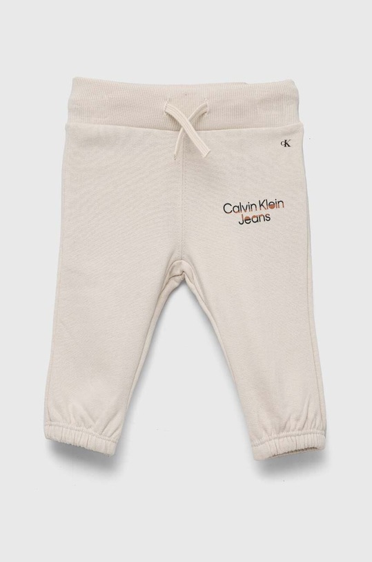 Calvin Klein Jeans spodnie dresowe niemowlęce bawełna beżowy IN0IN00082.9BYX