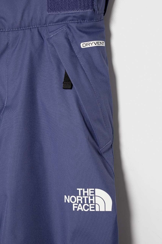 Chłopiec The North Face spodnie narciarskie SNOWQUEST SUSPENDER PANT NF0A8556 niebieski