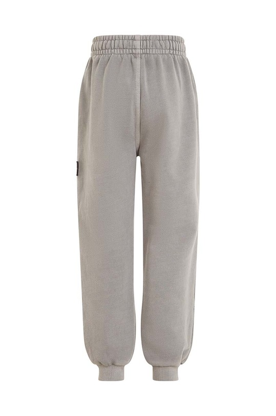 Chłopiec Calvin Klein Jeans spodnie dresowe bawełniane dziecięce IB0IB01810.9BYX czarny