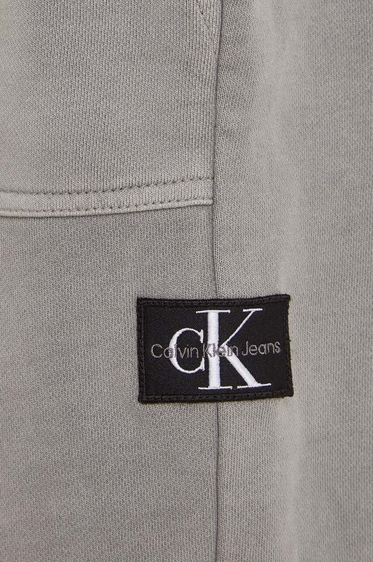Calvin Klein Jeans spodnie dresowe bawełniane dziecięce czarny IB0IB01810.9BYX