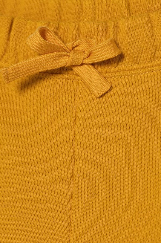 Chłopiec United Colors of Benetton spodnie dresowe bawełniane dziecięce 3J68GF027.P.SEASONAL żółty