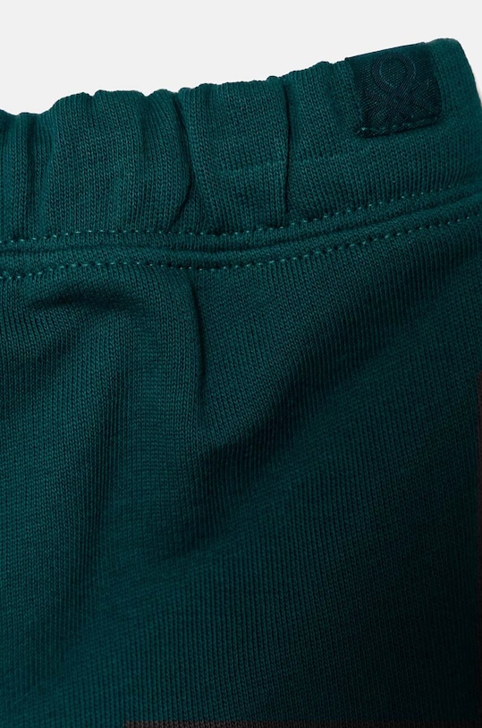 Chłopiec United Colors of Benetton spodnie dresowe bawełniane dziecięce 3J68GF027.P.SEASONAL zielony