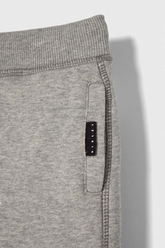 Chłopiec Sisley spodnie dresowe dziecięce 3PANXF014.G.SEASONAL szary