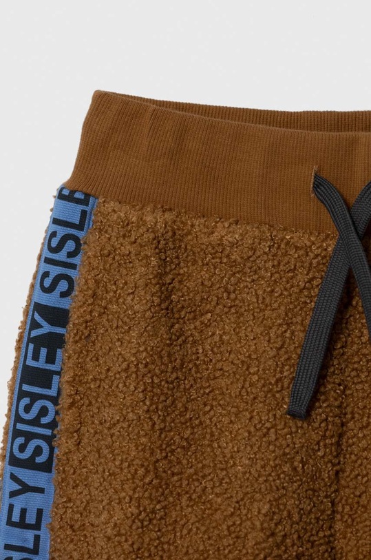 Chłopiec Sisley spodnie dresowe dziecięce 3SKKXF019.G.SEASONAL brązowy