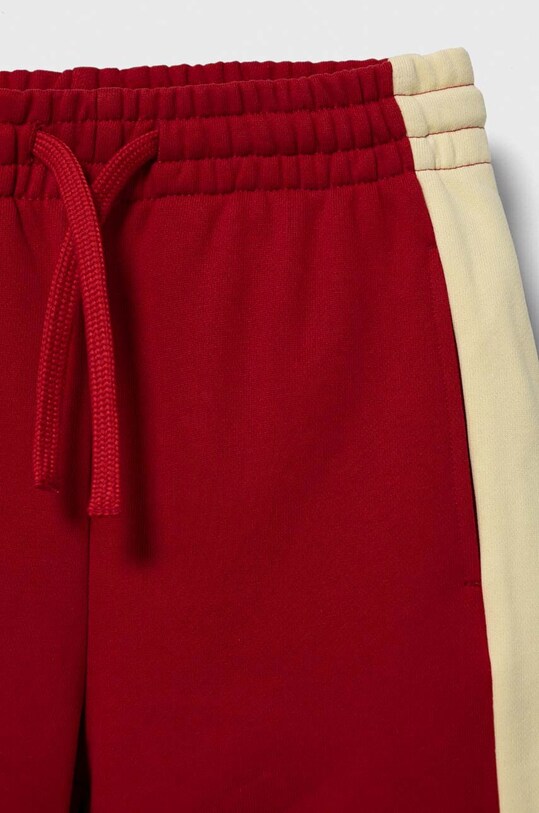 Chłopiec United Colors of Benetton spodnie dresowe bawełniane dziecięce 3FPPCF03W.G.SEASONAL czerwony