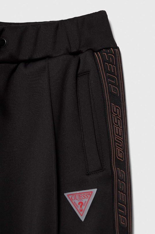 CHLAPEC Dětské tepláky Guess L3BQ16.KB212.9BYX černá