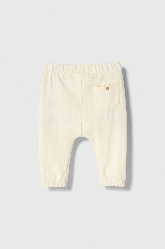 United Colors of Benetton spodnie dresowe niemowlęce 35MWAF01F.W.SEASONAL beżowy AW23