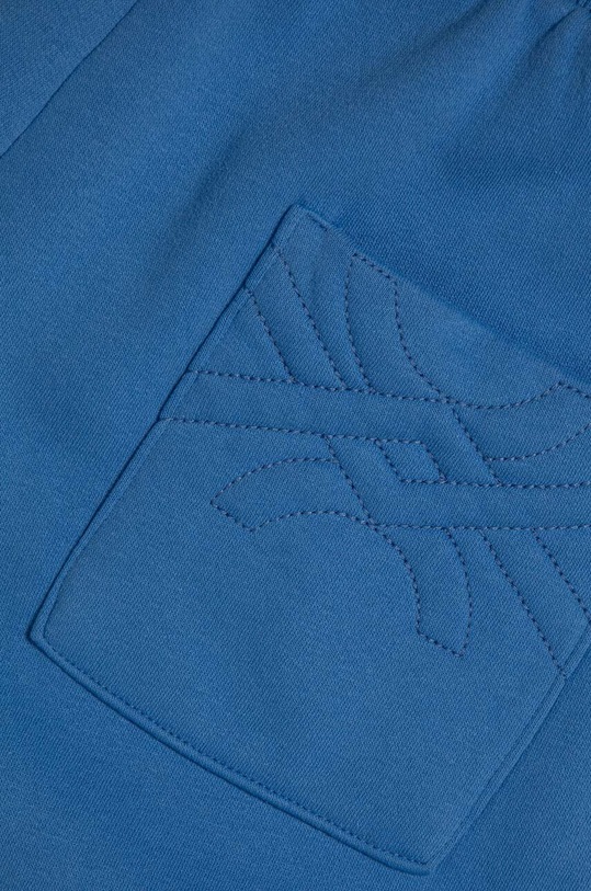 Chłopiec United Colors of Benetton spodnie dresowe dziecięce 3N2ZCF04I.G.SEASONAL niebieski