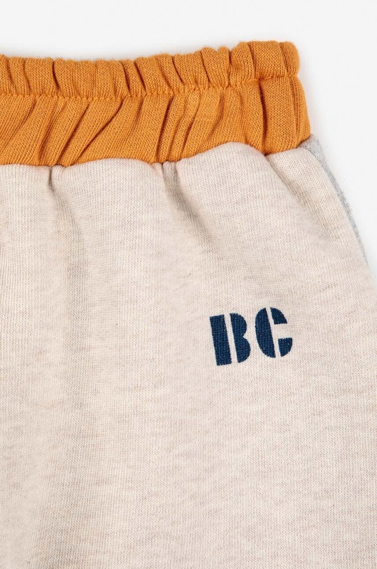 Bobo Choses spodnie dresowe bawełniane niemowlęce beżowy 223AB063