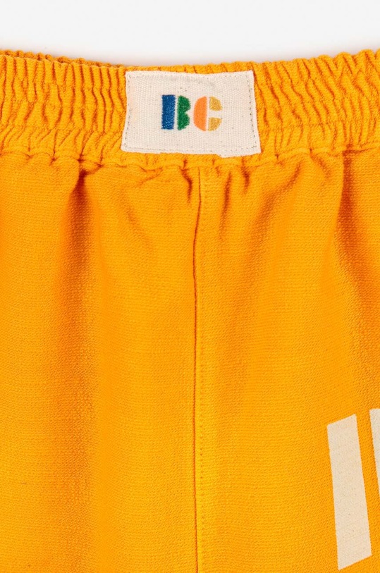 Bobo Choses spodnie dresowe bawełniane dziecięce pomarańczowy 223AC081