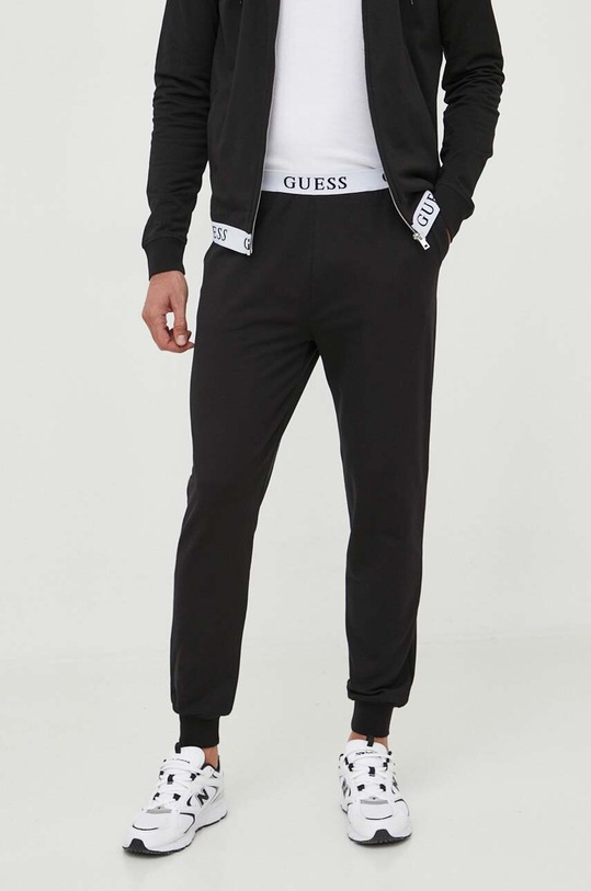 Guess spodnie dresowe z elastanem czarny U3YB00.KBS91
