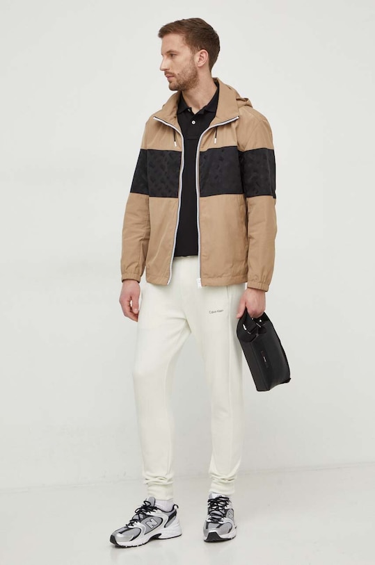 Спортивні штани Calvin Klein K10K109940 бежевий SS25