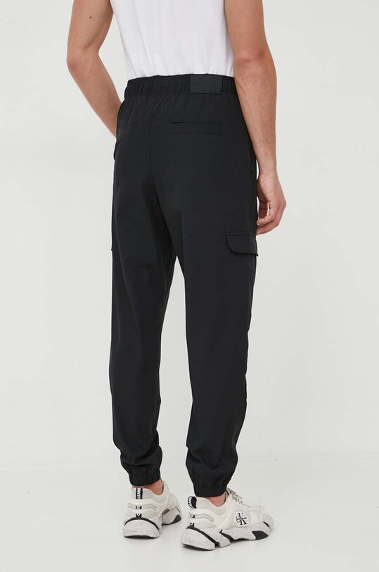 Oblačila Spodnji del trenirke Calvin Klein Jeans J30J323498 črna