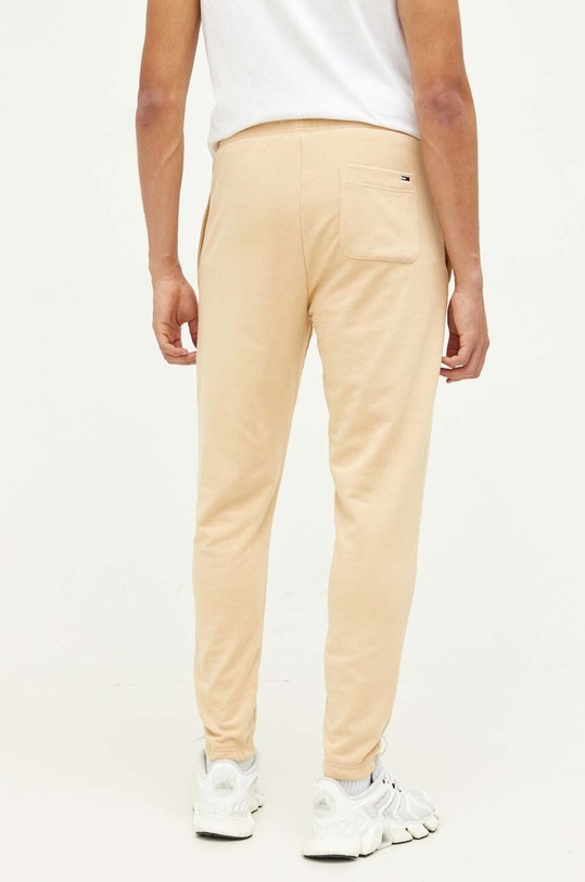 Odzież Tommy Jeans spodnie dresowe DM0DM16874 beżowy