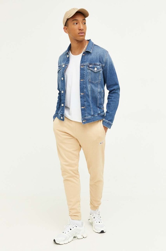 Tommy Jeans spodnie dresowe beżowy DM0DM16874