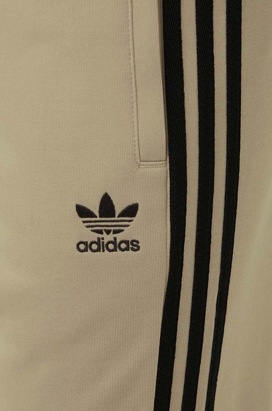 Tepláky adidas Originals béžová IM4544