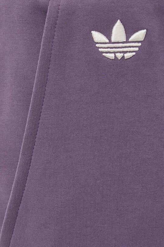 Tepláky adidas Originals fialová IN4677