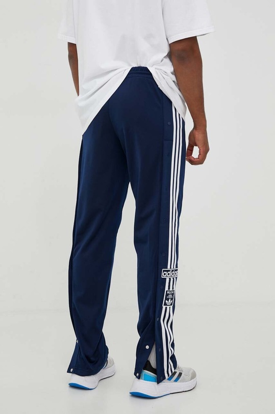 Oblečenie Tepláky adidas Originals IN8076 tmavomodrá