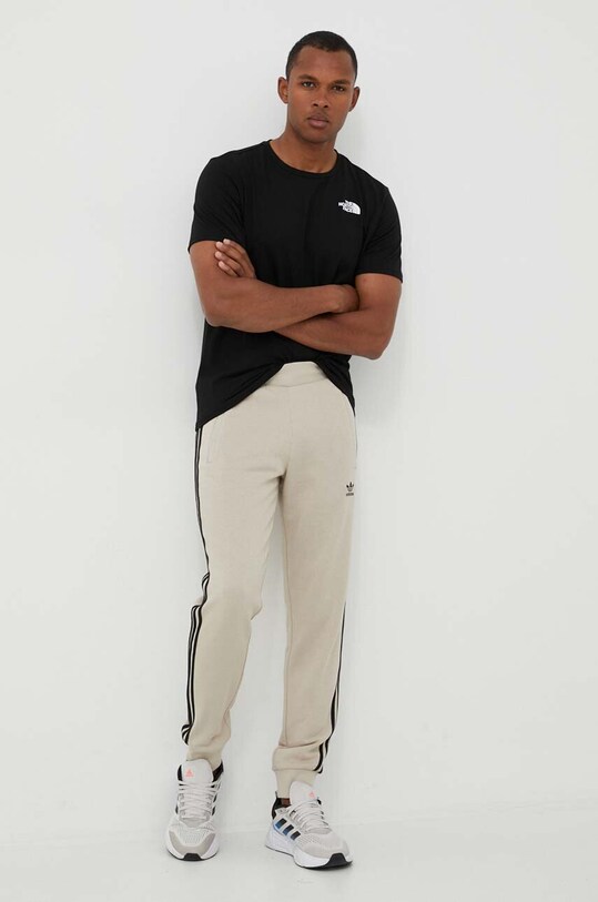 adidas Originals spodnie dresowe IK9121 beżowy AW23