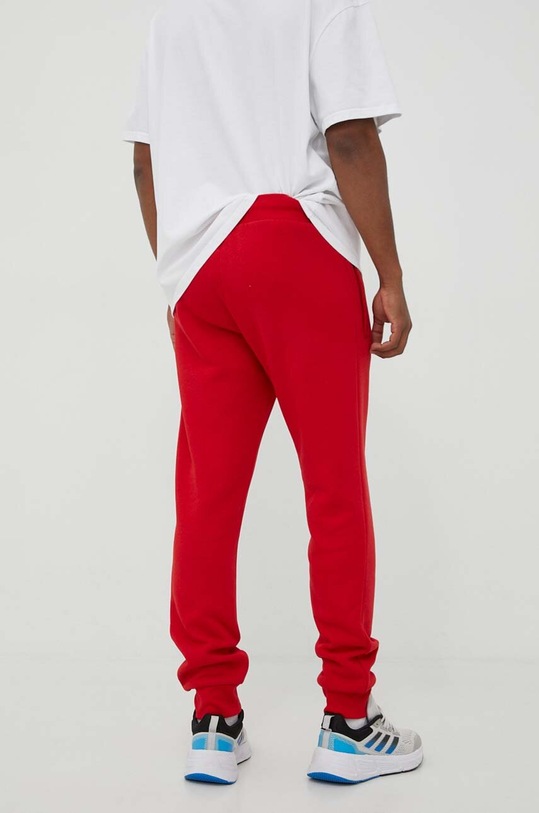 Oblečenie Tepláky adidas Originals IB2015 červená