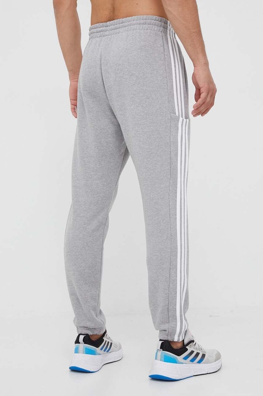Одяг Бавовняні спортивні штани adidas IC0052 сірий