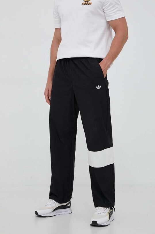 Tepláky adidas Originals látka černá HZ0705