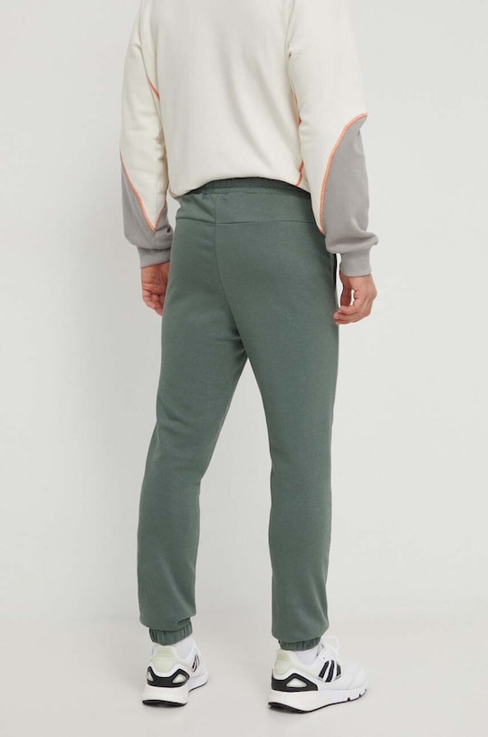 Odzież Fila spodnie dresowe VR46 FAM0470 zielony