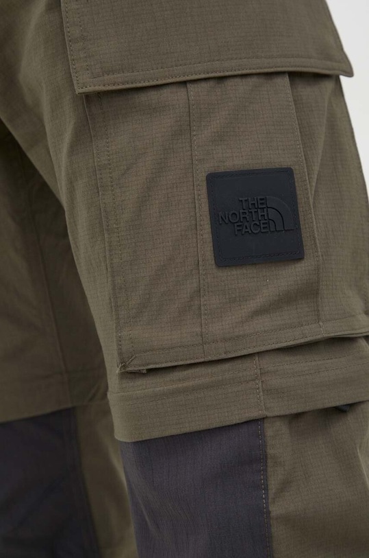 The North Face spodnie NF0A852U79K1 zielony