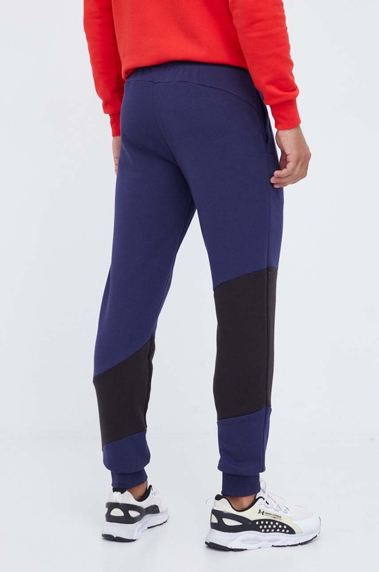 Odzież Puma spodnie dresowe 674207 granatowy