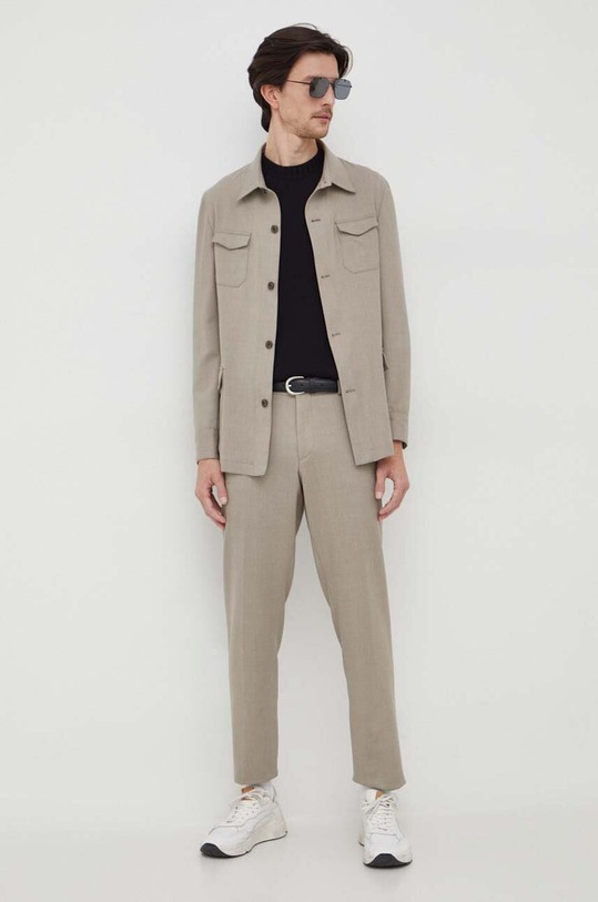 Michael Kors spodnie wełniane MK0SP01016 beżowy AW23