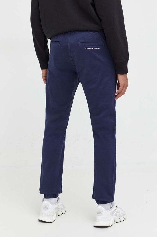 Odzież Tommy Jeans spodnie DM0DM17679 granatowy