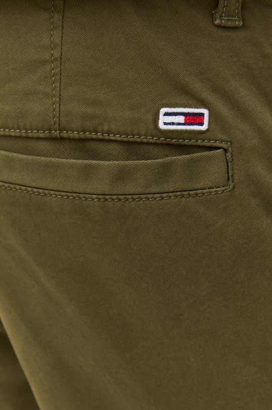 Odzież Tommy Jeans spodnie DM0DM17678 zielony