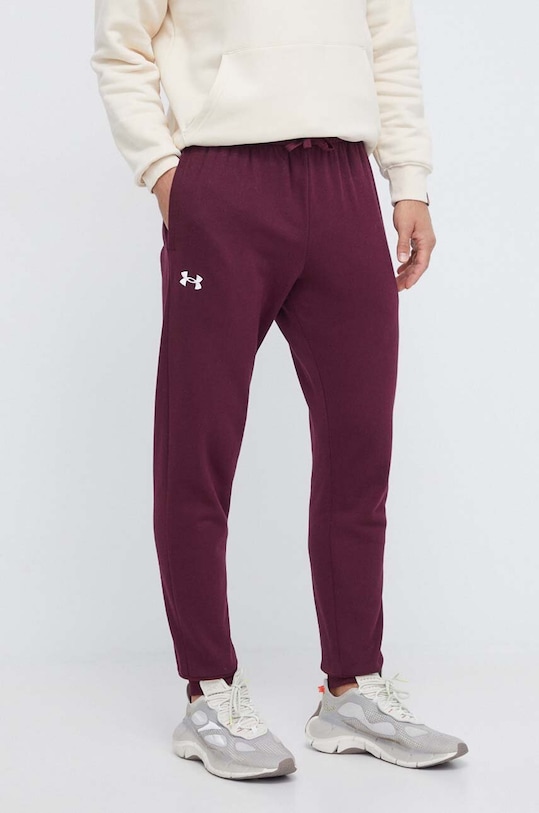 Under Armour spodnie dresowe dzianina bordowy 1379774