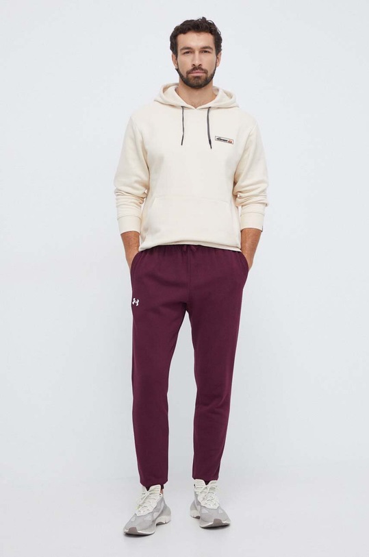 Under Armour spodnie dresowe 1379774 bordowy SS24