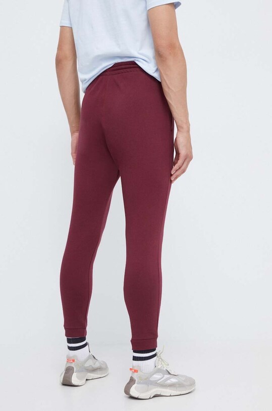 Odzież Reebok spodnie dresowe 100071033 bordowy