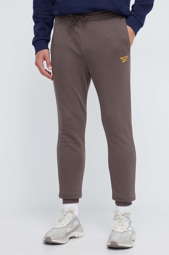 Reebok spodnie dresowe dzianina brązowy 100071046