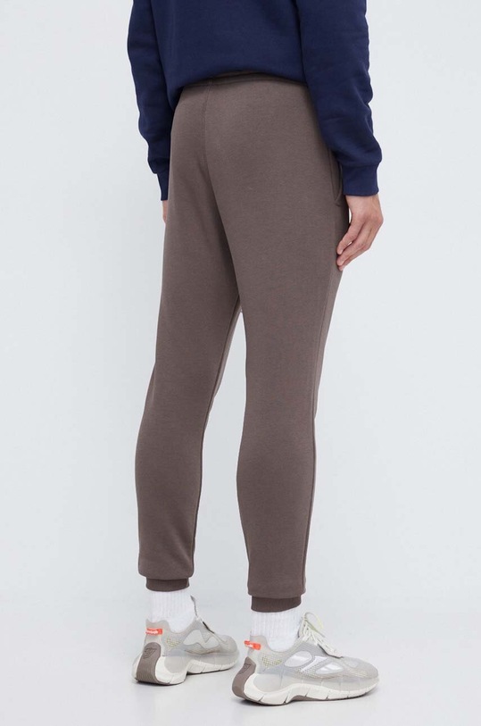 Odzież Reebok spodnie dresowe 100071046 brązowy