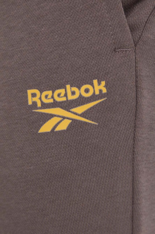 Reebok spodnie dresowe brązowy 100071046