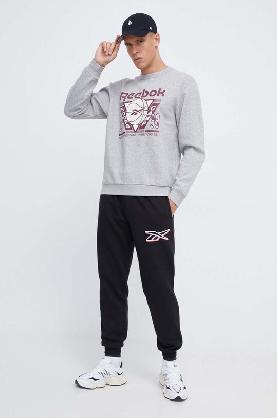 Reebok spodnie dresowe 100071092 czarny AW23