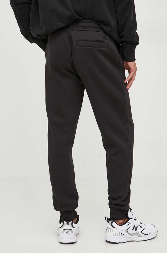 Odzież Calvin Klein Jeans spodnie dresowe J30J324053 czarny