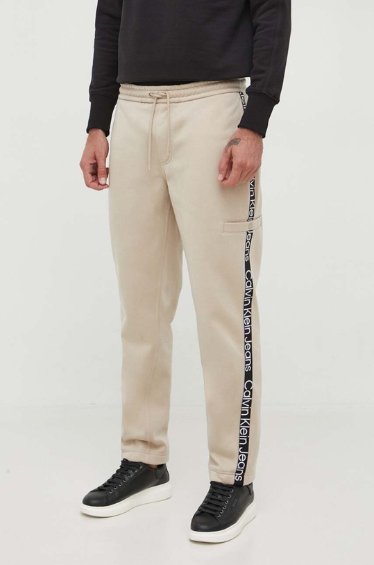 Calvin Klein Jeans spodnie dresowe dzianina beżowy J30J324376